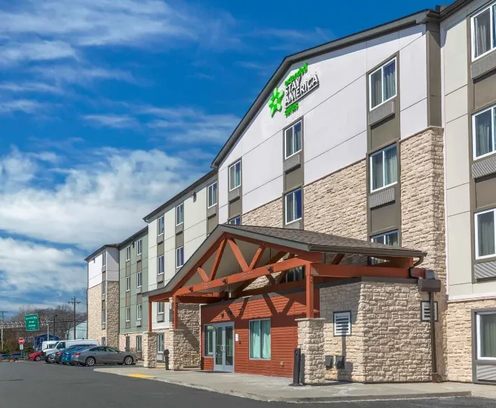 A photo of the front of an Extended Stay America hotel.