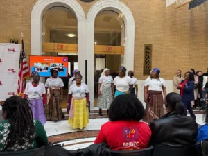 A group of ten Haitian dancers performing at the Massachusetts state house
